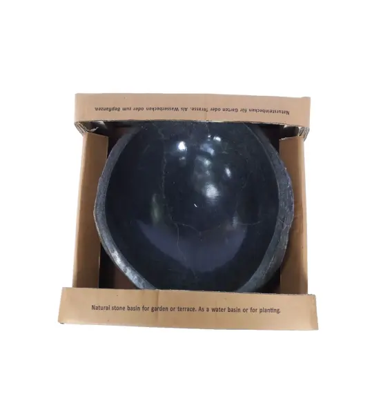 Product image of the product “Water basin made of river stone. Model 2, approx. 29 x 33 x 14cm height. ”